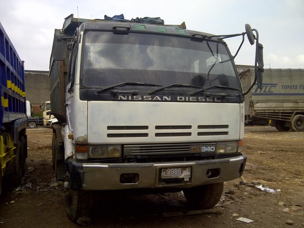 DIJUAL Nissan Build Up CW520 6x4 DUMP TRUCK Tahun 1998